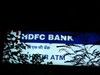 A back-lit sign of HDFC bank ATM. Pune,India. May 29, 2009