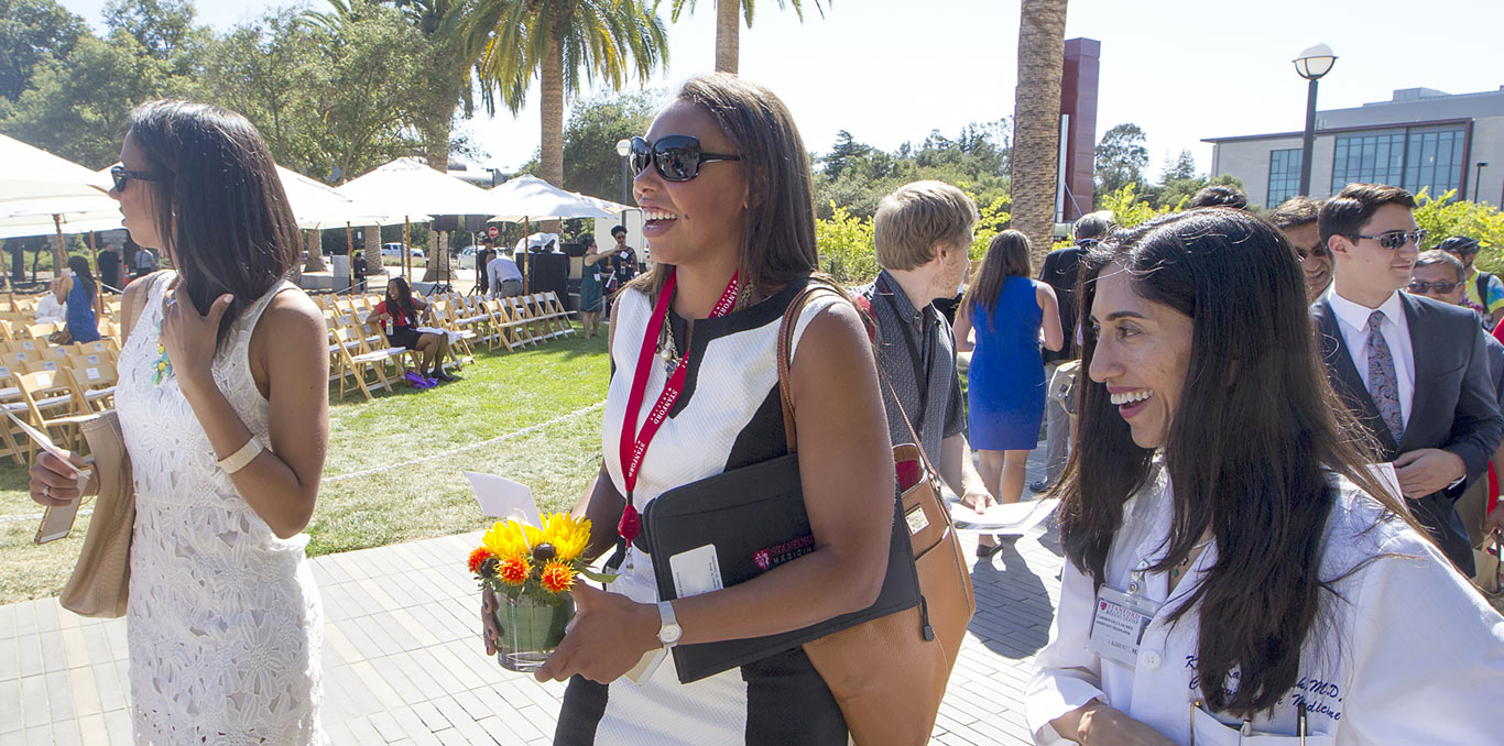 Three women walking the Discovery walk at School of Medicine