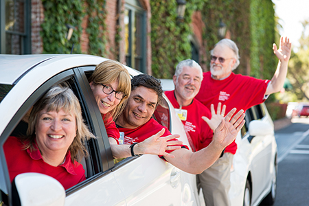 Care-A-Van car and volunteers