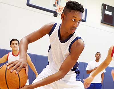 Boy playing basketball