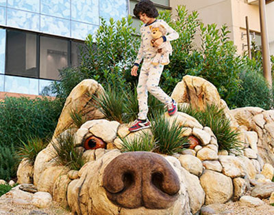 Packard children's patient and her mom in the garden