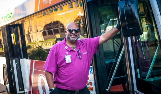 driver standing in front of Marguerite bus