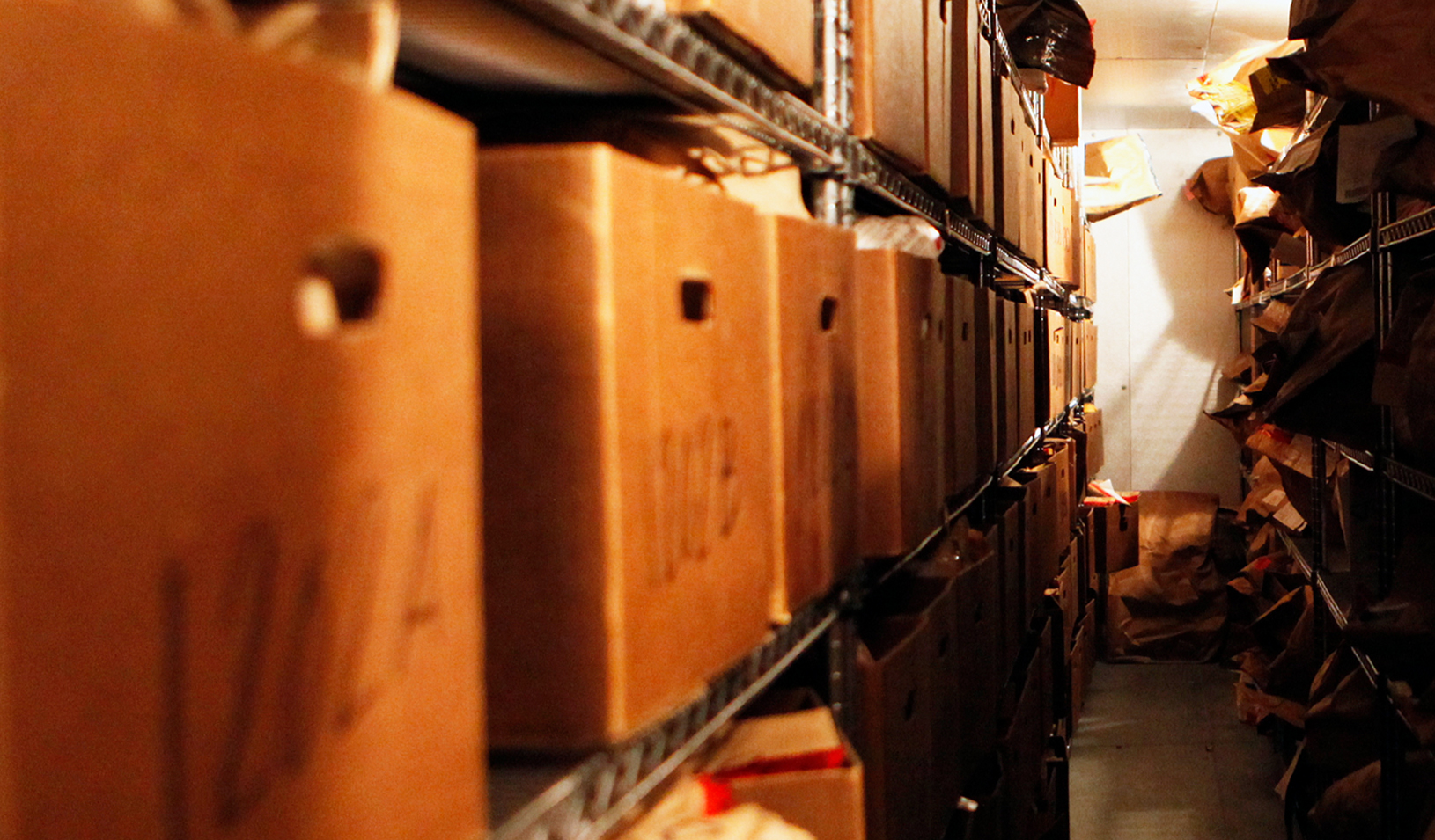 Forensic lab storage room shelves overflowing with untested rape kits | Photo courtesy of Joyful Heart Foundation